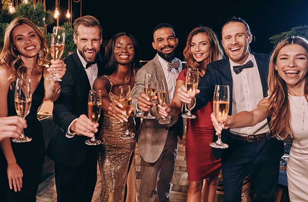 7 people toasting at an event