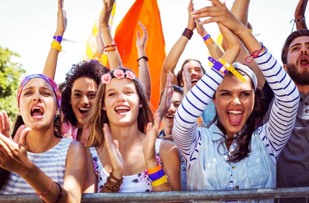 group of females mixed age and ethnic friends having fun at a festival